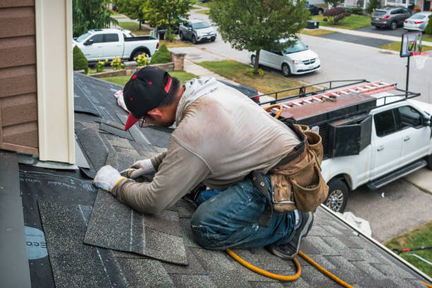Professional Roofing technician working in Girard, IL